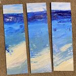 A triptych of ocean paintings created in acrylic paint on three narrow wood panels